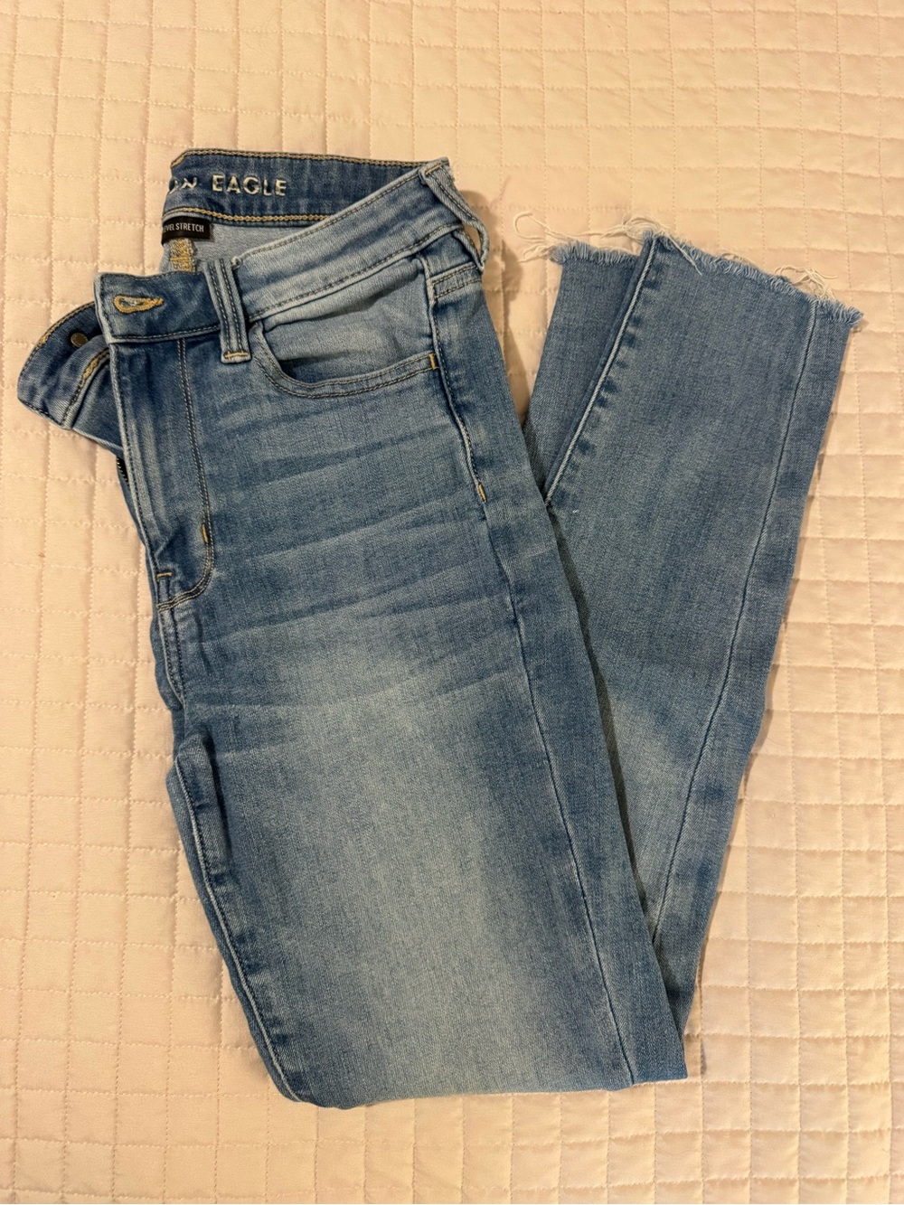 American Eagle Outfitters Light Wash Skinny Jeans with Frayed Hem